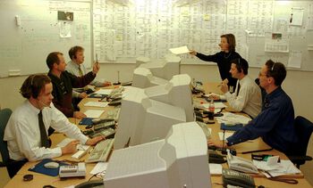 I 1993 ble samkjøringen av de norske kraftverkene samlet i Statnett. Datterselskapet Statnett Marked AS fikk ansvaret for omsetning av elektrisk energi på det åpne marked. I 1996 skiftet selskapet navn til Nord Pool ASA og fikk ansvaret for en felles nordisk kraftbørs, som deleid av Statnett og det svenske Svenska Kraftnät. Her fra Nord Pools kontor i 1997.&amp;#160;Les mer om hvordan staten i mindre grad styrte samfunnsøkonomien fra slutten av 1970-årene .&amp;#160;Foto: Berit Roald/NTB scanpix