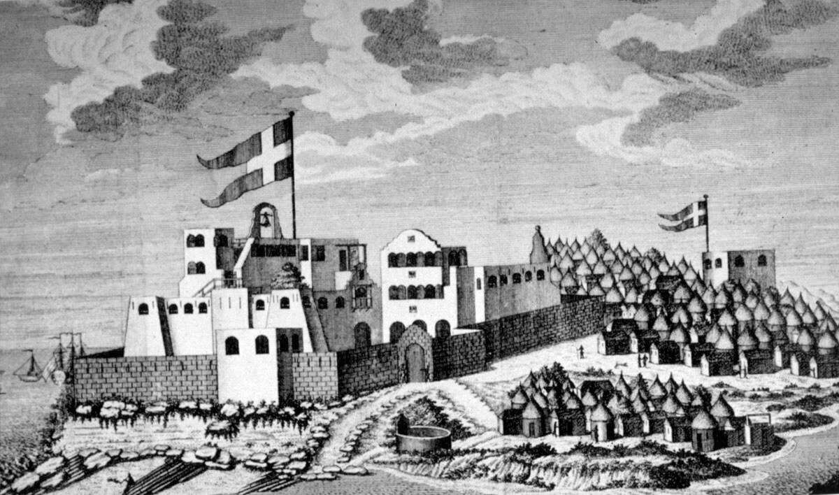 Bildet viser fortet Christiansborg med små bygg omkring